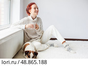 Young Woman Drinking hot coffee at white room. Стоковое фото, фотограф Гладских Татьяна / Фотобанк Лори