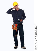 Woodworker holding a sander. Стоковое фото, агентство Ingram Publishing / Фотобанк Лори