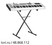gray synthesizer on stand isolated on white background. Стоковое фото, агентство Ingram Publishing / Фотобанк Лори