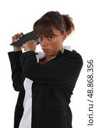 young businesswoman looking angry. Стоковое фото, агентство Ingram Publishing / Фотобанк Лори