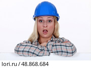A surprised construction worker. Стоковое фото, агентство Ingram Publishing / Фотобанк Лори
