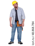 Craftsman looking tired. Стоковое фото, агентство Ingram Publishing / Фотобанк Лори