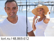 Carefree couple on holiday together. Стоковое фото, агентство Ingram Publishing / Фотобанк Лори