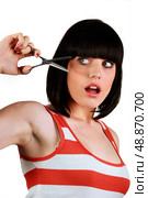 Brunette with scissors. Стоковое фото, агентство Ingram Publishing / Фотобанк Лори