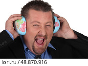 Man listening to the world. Стоковое фото, агентство Ingram Publishing / Фотобанк Лори