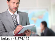 Businessman writing. Стоковое фото, агентство Ingram Publishing / Фотобанк Лори