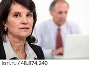 Bored and tired woman at work. Стоковое фото, агентство Ingram Publishing / Фотобанк Лори