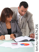 Businesspeople interpreting financial results. Стоковое фото, агентство Ingram Publishing / Фотобанк Лори