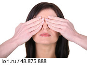 Woman with her hands over her eyes. Стоковое фото, агентство Ingram Publishing / Фотобанк Лори