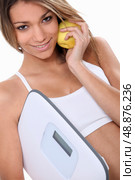Portrait of a woman on a diet. Стоковое фото, агентство Ingram Publishing / Фотобанк Лори