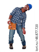 Tradesman suffering. Стоковое фото, агентство Ingram Publishing / Фотобанк Лори