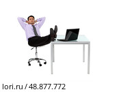 Businessman resting his feet on desk. Стоковое фото, агентство Ingram Publishing / Фотобанк Лори