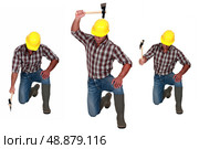 Man hitting the floor with hatchet. Стоковое фото, агентство Ingram Publishing / Фотобанк Лори