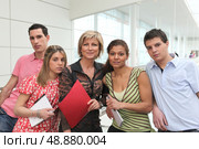 Students posing with their teacher. Стоковое фото, агентство Ingram Publishing / Фотобанк Лори