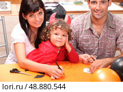 A family at Halloween. Стоковое фото, агентство Ingram Publishing / Фотобанк Лори