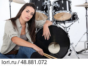 Woman with her drum set. Стоковое фото, агентство Ingram Publishing / Фотобанк Лори