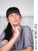young woman wondering. Стоковое фото, агентство Ingram Publishing / Фотобанк Лори