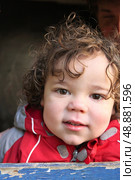 Little boy outside in winter coat. Стоковое фото, агентство Ingram Publishing / Фотобанк Лори