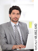 Job applicant with laptop. Стоковое фото, агентство Ingram Publishing / Фотобанк Лори