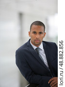 Confident businessman leaning. Стоковое фото, агентство Ingram Publishing / Фотобанк Лори