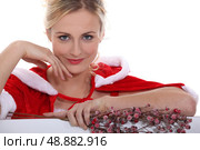 Woman dressed to celebrate Christmas. Стоковое фото, агентство Ingram Publishing / Фотобанк Лори
