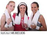 three women resting after fitness. Стоковое фото, агентство Ingram Publishing / Фотобанк Лори