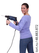 Woman with drill. Стоковое фото, агентство Ingram Publishing / Фотобанк Лори