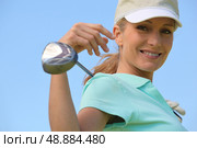 Woman with golf club. Стоковое фото, агентство Ingram Publishing / Фотобанк Лори