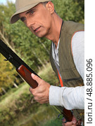 Hunter with a shotgun. Стоковое фото, агентство Ingram Publishing / Фотобанк Лори