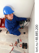 Female electrician. Стоковое фото, агентство Ingram Publishing / Фотобанк Лори