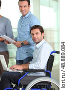 Young man in wheelchair. Стоковое фото, агентство Ingram Publishing / Фотобанк Лори