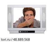 Man gasping inside a TV screen. Стоковое фото, агентство Ingram Publishing / Фотобанк Лори