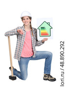 Construction worker promoting energy savings. Стоковое фото, агентство Ingram Publishing / Фотобанк Лори
