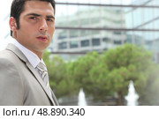 Young businessman looks concerned. Стоковое фото, агентство Ingram Publishing / Фотобанк Лори
