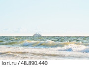 The ship sails on rough seas near the shore. Стоковое фото, фотограф Дмитрий Попов / Фотобанк Лори