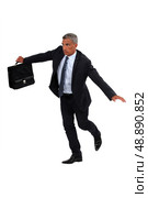 Businessman balancing on rope. Стоковое фото, агентство Ingram Publishing / Фотобанк Лори