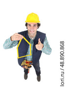 Construction worker with his folding ruler. Стоковое фото, агентство Ingram Publishing / Фотобанк Лори