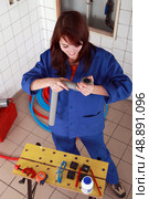 Repair girl with tools. Стоковое фото, агентство Ingram Publishing / Фотобанк Лори