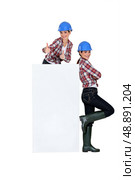 photomontage of girl with blue hard hat. Стоковое фото, агентство Ingram Publishing / Фотобанк Лори