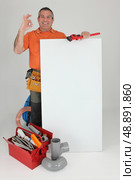 Plumber smiling. Стоковое фото, агентство Ingram Publishing / Фотобанк Лори
