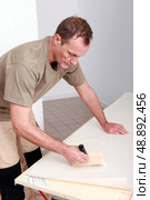 Artisan writing measures. Стоковое фото, агентство Ingram Publishing / Фотобанк Лори