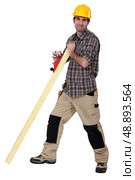 Tradesman smoothing wood. Стоковое фото, агентство Ingram Publishing / Фотобанк Лори