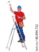 Electrician working. Стоковое фото, агентство Ingram Publishing / Фотобанк Лори
