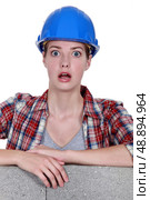 A wide-eyed tradeswoman. Стоковое фото, агентство Ingram Publishing / Фотобанк Лори