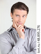 Smart man looking indifferent. Стоковое фото, агентство Ingram Publishing / Фотобанк Лори