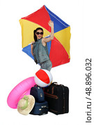 Woman leaving on a beach holiday. Стоковое фото, агентство Ingram Publishing / Фотобанк Лори