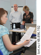 young woman in examination. Стоковое фото, агентство Ingram Publishing / Фотобанк Лори