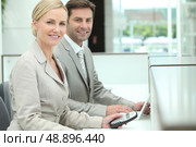 Smiling receptionists. Стоковое фото, агентство Ingram Publishing / Фотобанк Лори