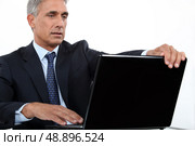 executive with computer. Стоковое фото, агентство Ingram Publishing / Фотобанк Лори