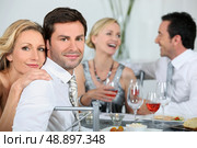 Couple at a dinner party. Стоковое фото, агентство Ingram Publishing / Фотобанк Лори